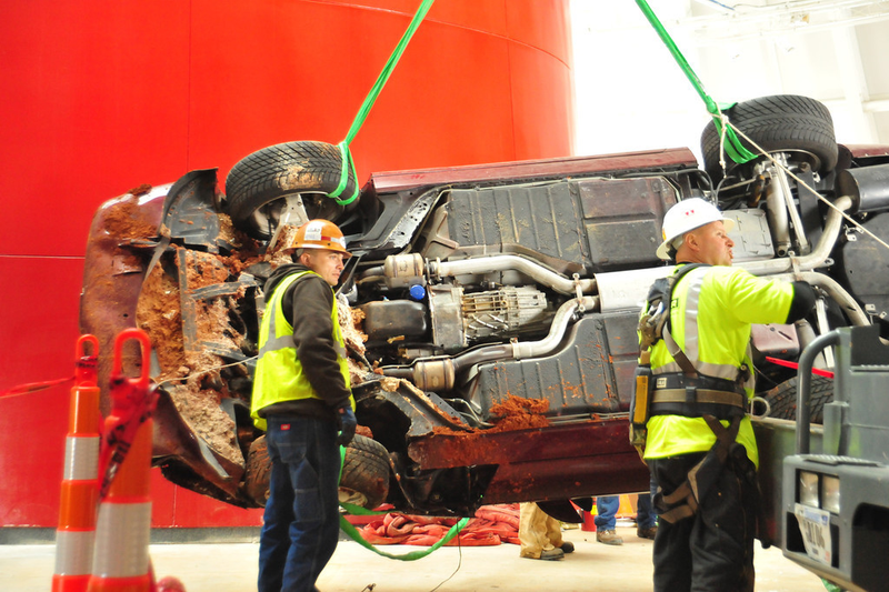Illustration for article titled Check Out These Amazing Photos From The Corvette Sinkhole Recovery